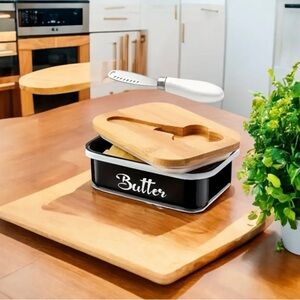 NWT BUTTER KEEPER WITH BUTTER KNIFE BLACK METAL WITH WHITE LETTERING WOODEN LID